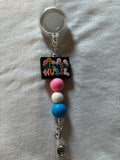 Nurse with Flowers Badge Reel