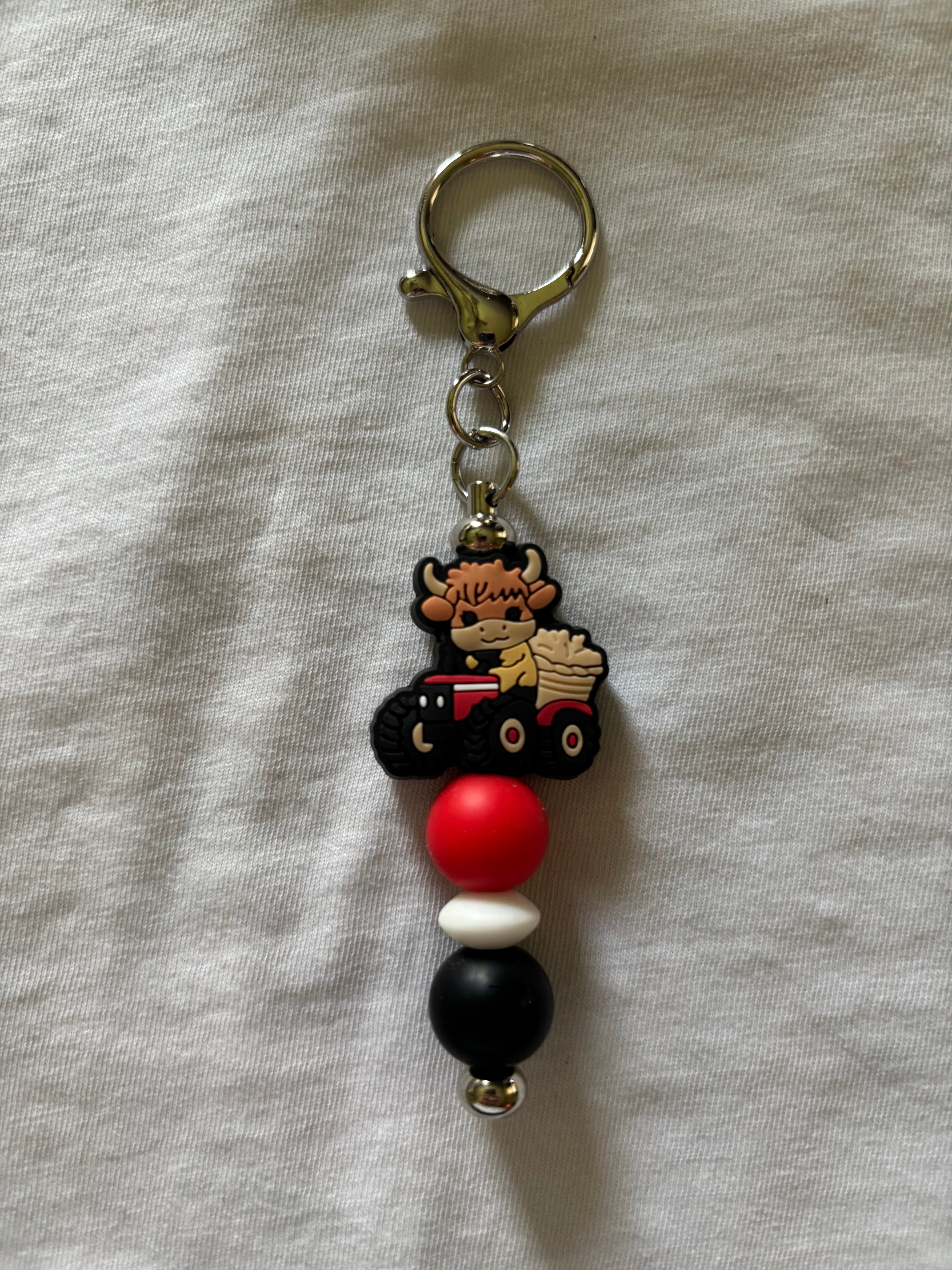 Highland Cow on Tractor Keychain