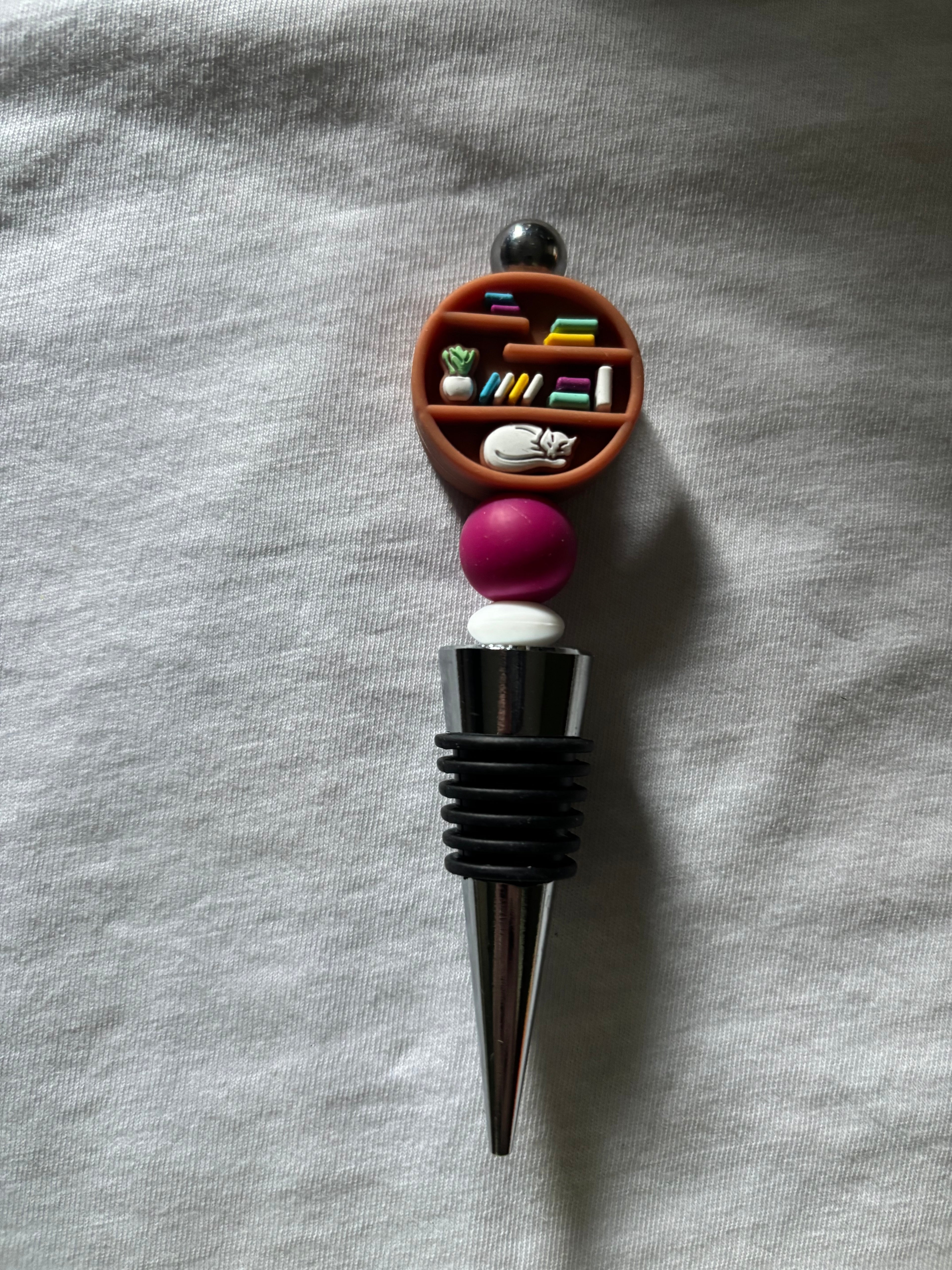Bookshelf with Cat Wine Stopper